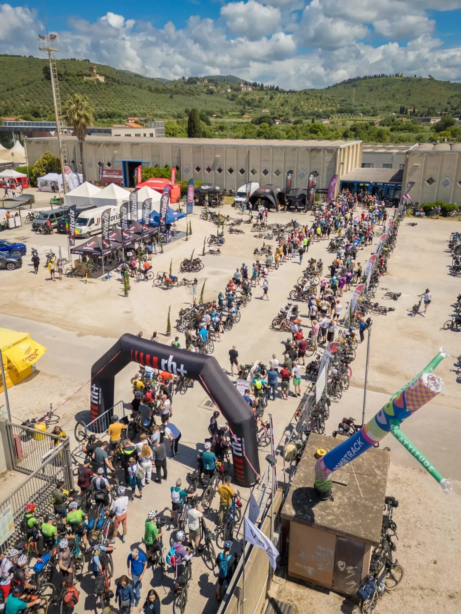 Thousands of riders with loaded bikes at the start of the Tuscany Trail, seen from above